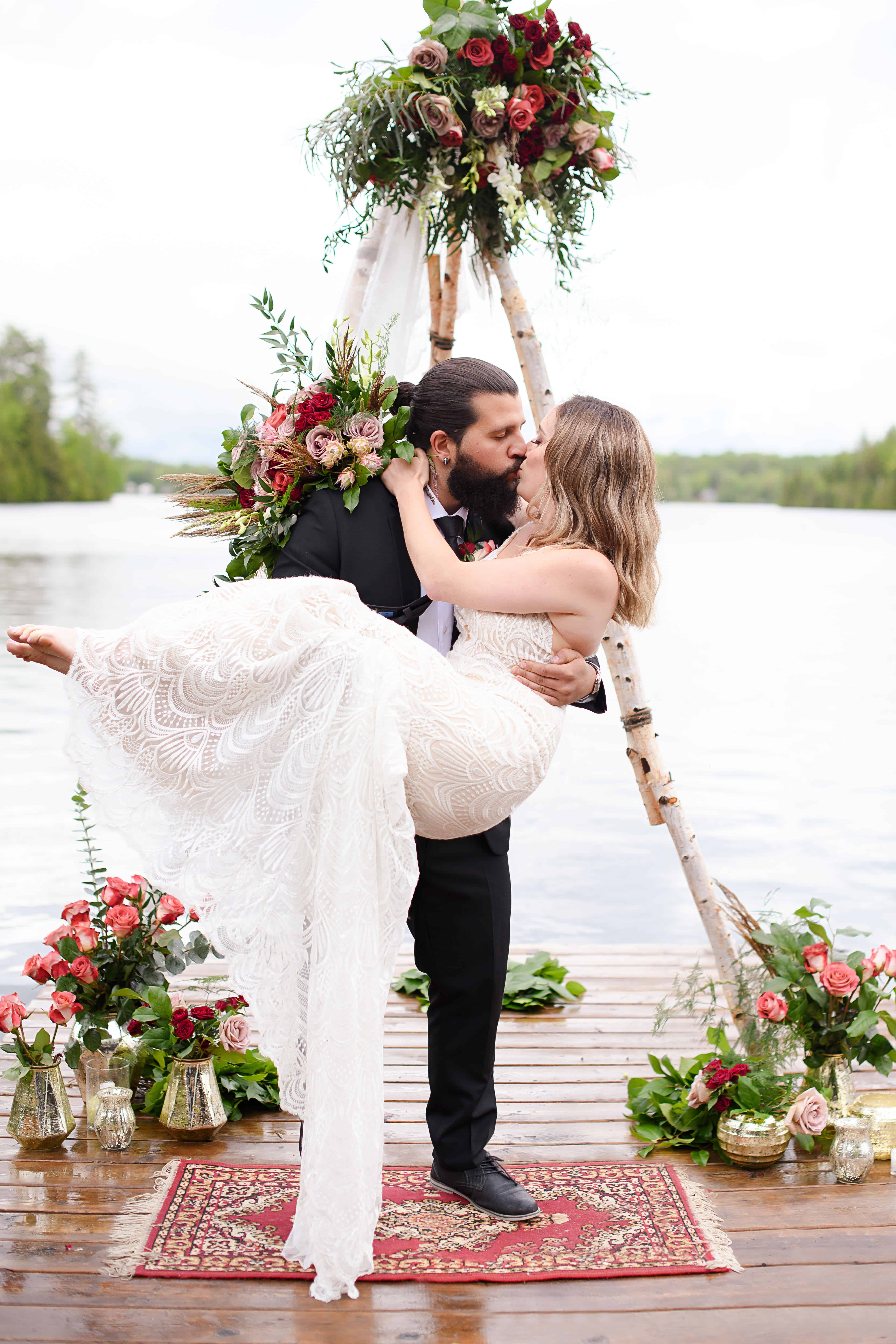 I do Groom carrying is bride down the aisle in Muskoka elopement